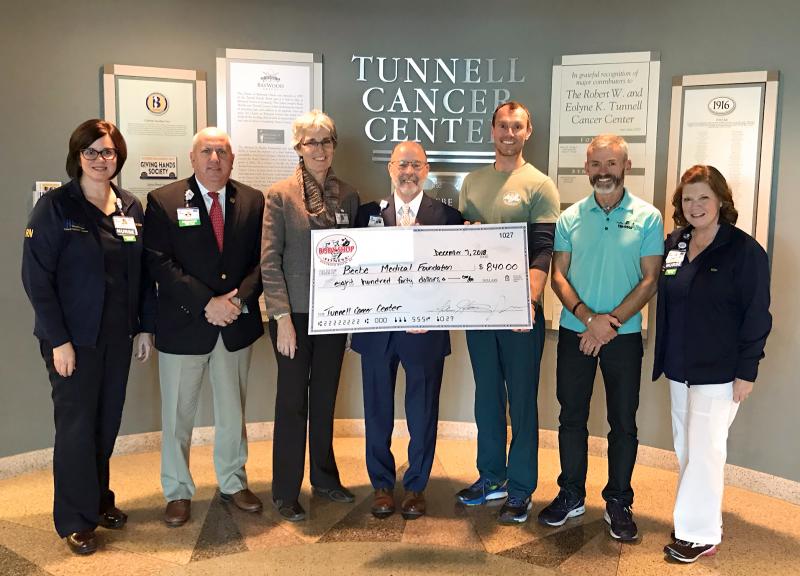 Check presentation attendees shown are (l-r) Lisa Henderson, Tunnell Cancer Center; Tom Protack, Beebe Medical Foundation vice president of development; Diane Barlow, Beebe Medical Foundation gift planning officer; Barry Hamp, executive director, oncology services; Adam Howard, The Body Shop; Bruce Clayton, The Body Shop; and Kim Ennis, Tunnell Cancer Center. SUBMITTED PHOTO